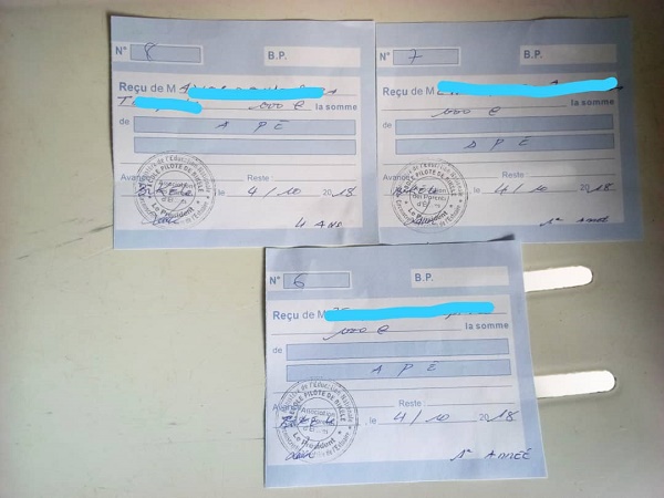 Sur les reçus de l’Ecole Pilote de Bikélé, le montant payé, 6.000 Fcfa n’apparaît pas.,